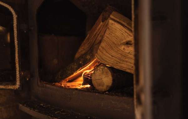 Creating a Cozy Atmosphere with Kiln-Dried Firewood and a Wood Burning Stove
